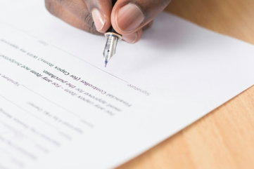 person-writing-on-white-paper.jpg person writing on white paper